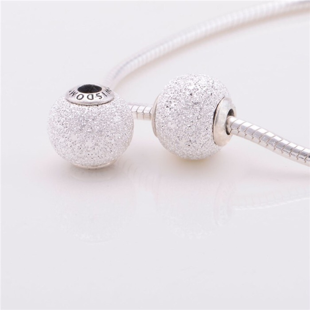 Pandora Essence Wisdom charm